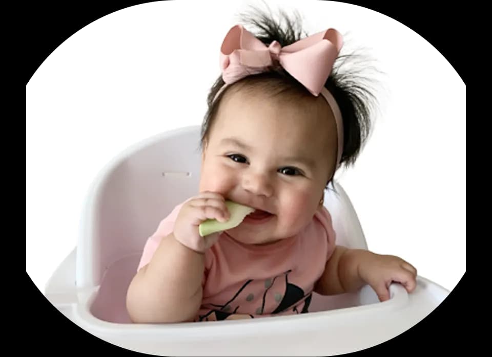 Happy baby eating
